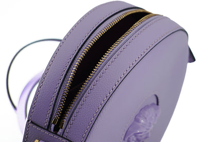 Elegante bolso de hombro redondo morado