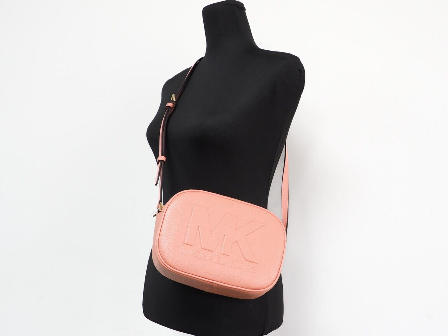 Bolso bandolera ovalado Jet Set Travel mediano de piel Sherbert para cámara