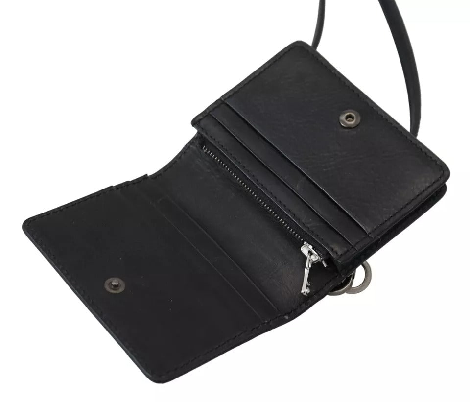 Cartera de mujer con bandolera de piel negra y dos pliegues